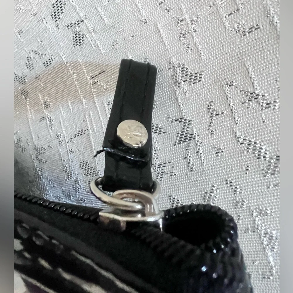 Black and White Polka Dot Cosmetic Bag with Skull Accents